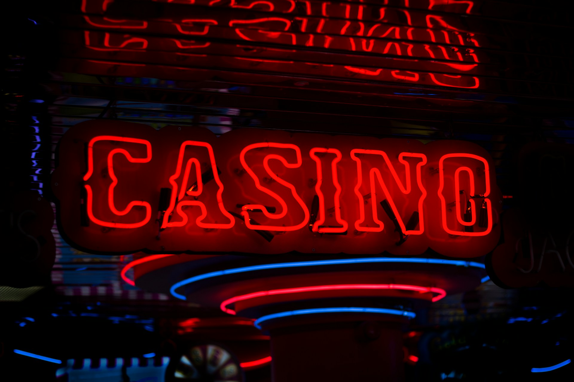A lit-up red neon sign that says "Casino."